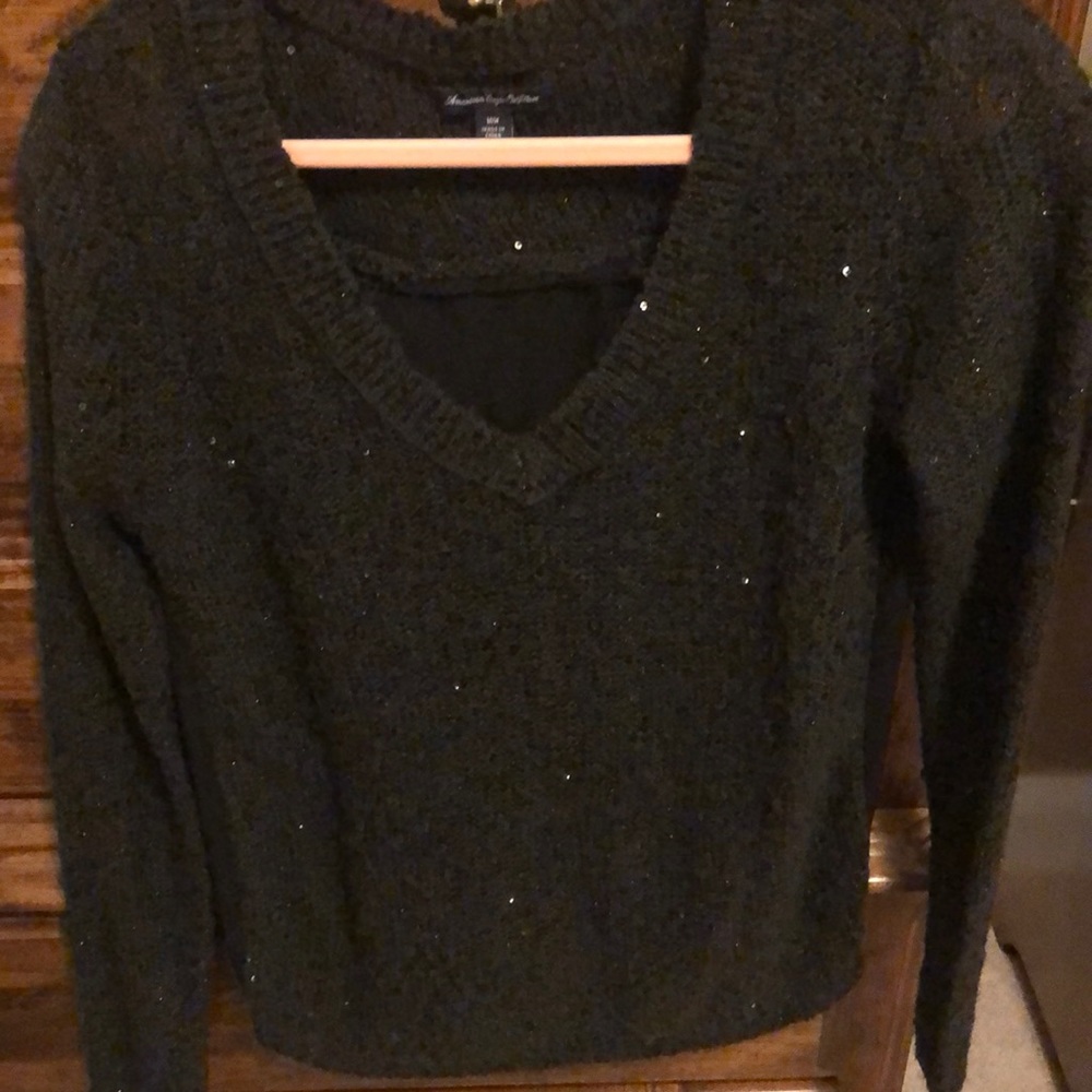 Sweater with sparkle detail.